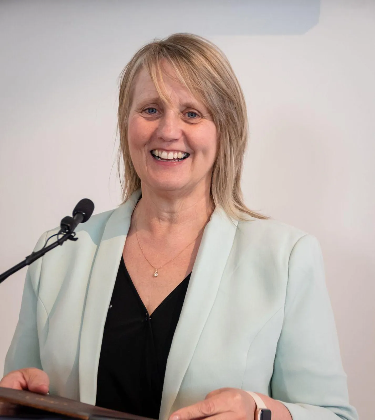 Cate Reid Ceremonies - Cate speaking on podium