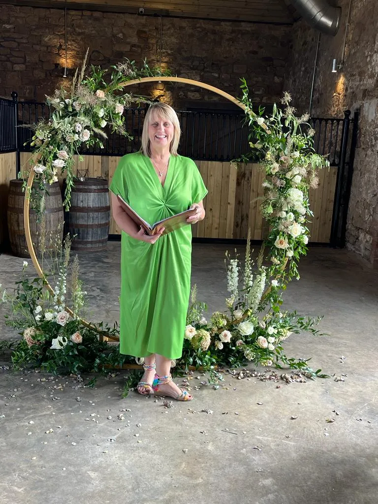 Cate Reid Ceremonies - Cate in green dress